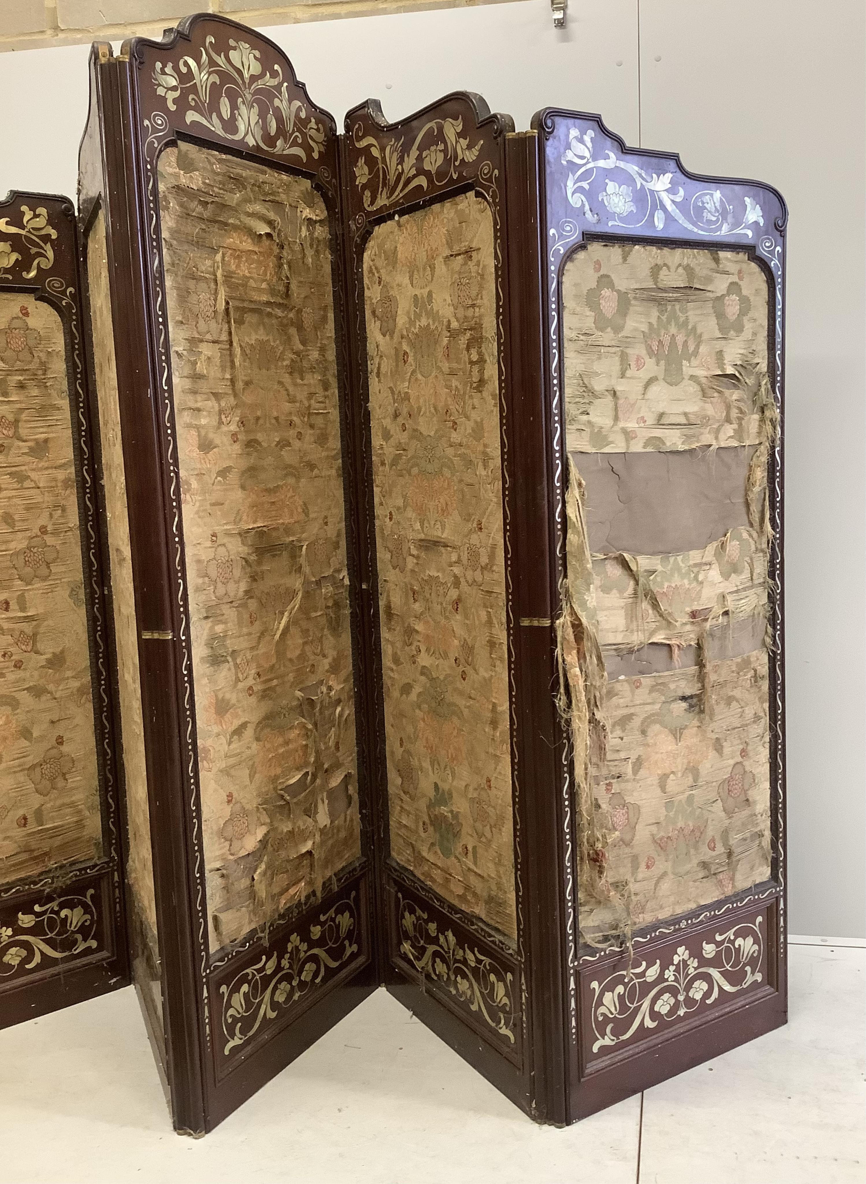 An Art Nouveau mother of pearl inlaid five fold screen, inset silk thread embroidered panels, largest panel width 64cm, height 213cm. Condition - fair to good, one panel poor